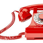 Ein rotes Wählscheibentelefon symbolisiert den Telefon-Knigge